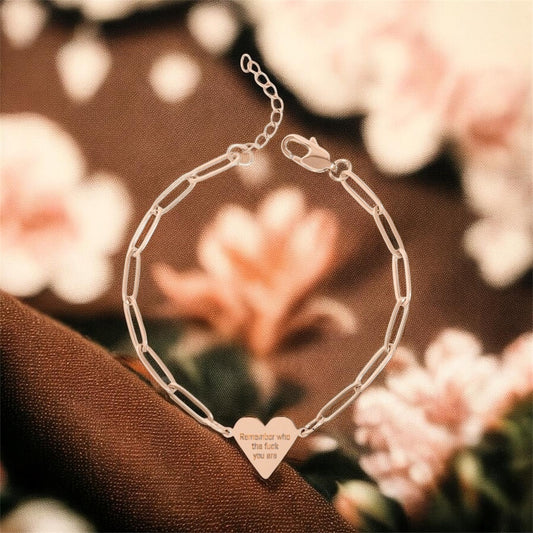 “REMEMBER WHO THE FUCK YOU ARE”— Heart bracelet